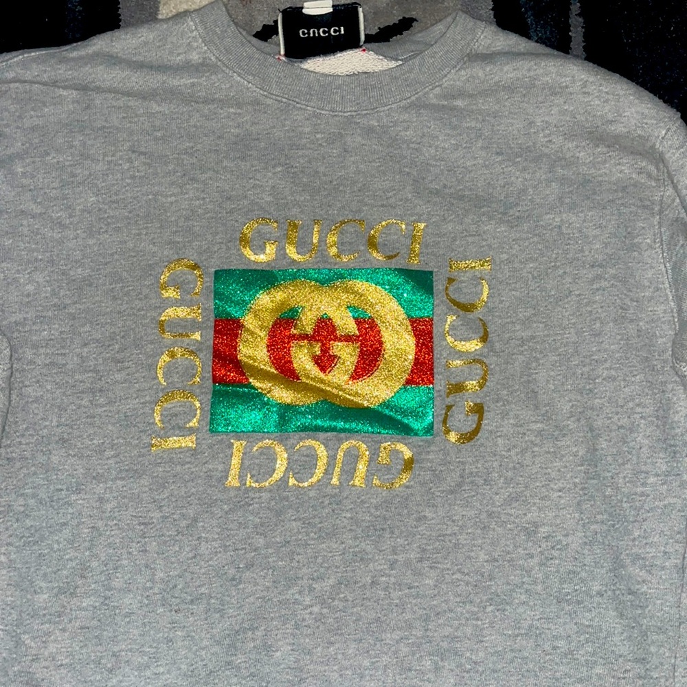 Selling a Gucci sweaters, worn once and it’s in pretty good condition